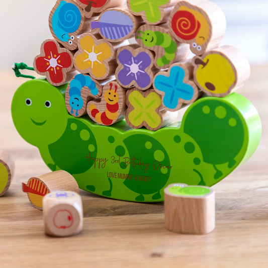 Wooden caterpillar balance game with personalisation for birthday gift