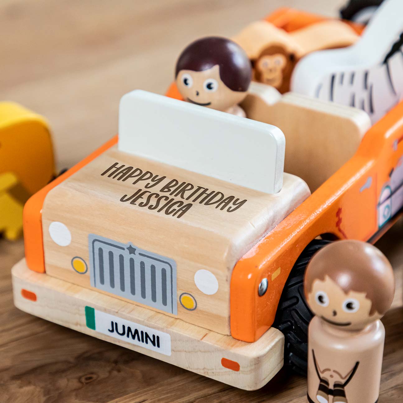 Close up of personalisation on jungle jeep toy