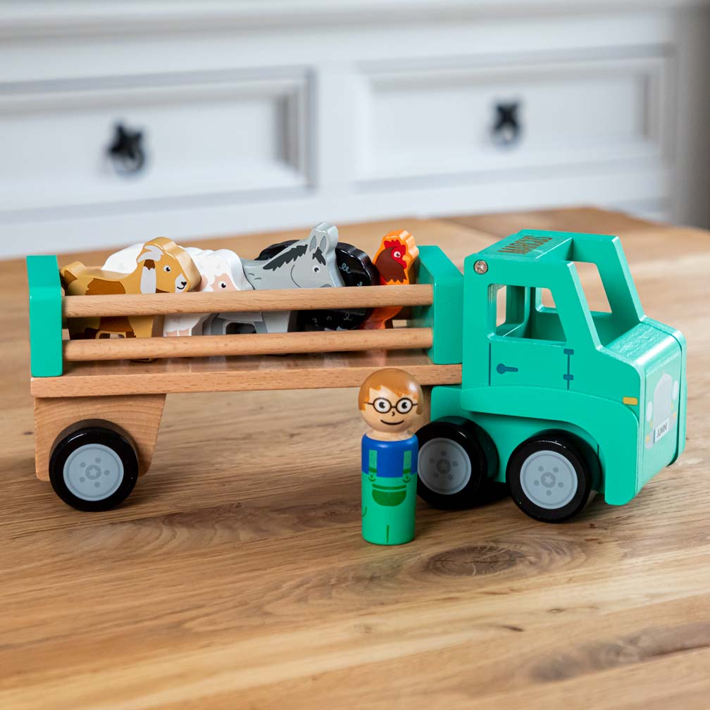 Farm lorry with trailer and farmyard animals and farmer toy