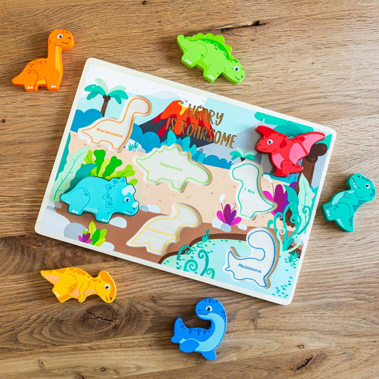 Personalised dinosaur puzzle with dinosaur pieces removed