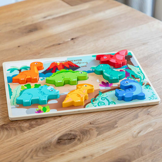 Wooden dinosaur puzzle with personalisation for a Christening gift