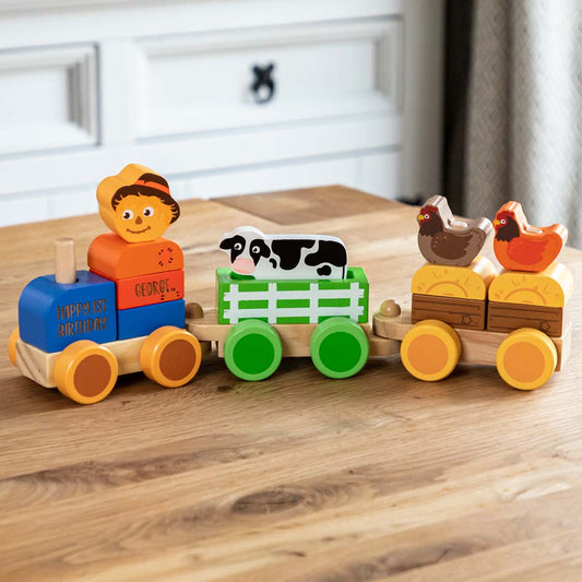 Wooden farm train toy with scarecrow and animals