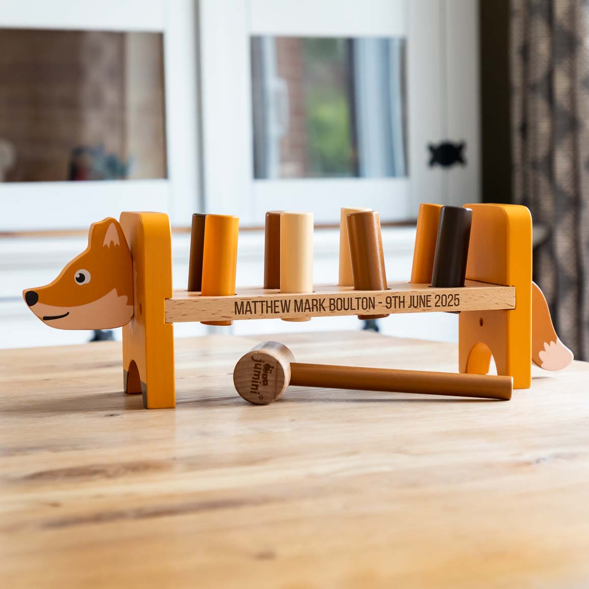 Wooden fox hammer bench with 8 pegs and hammer