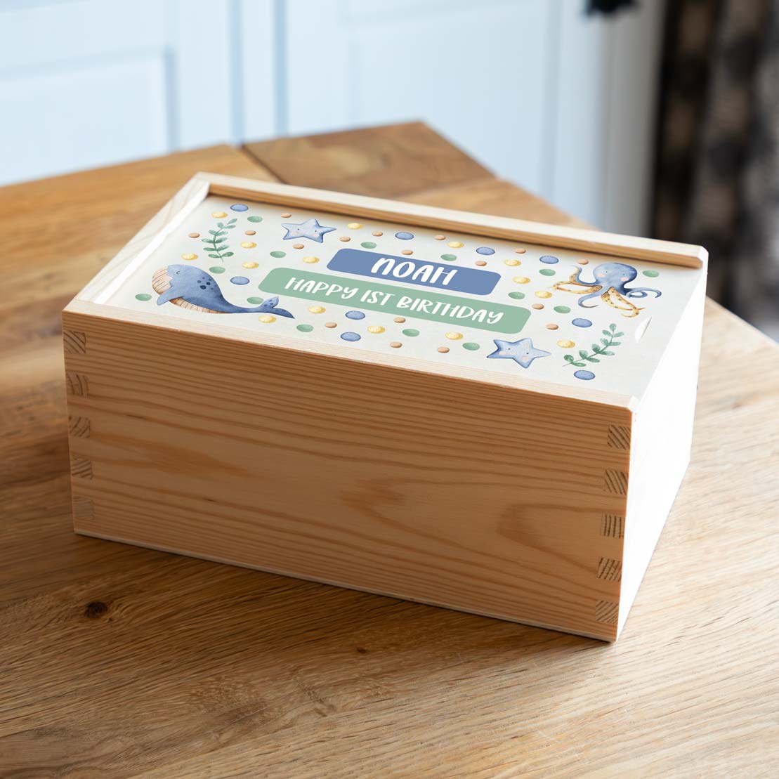 Personalised 1st birthday keepsake box with a sea animals design.