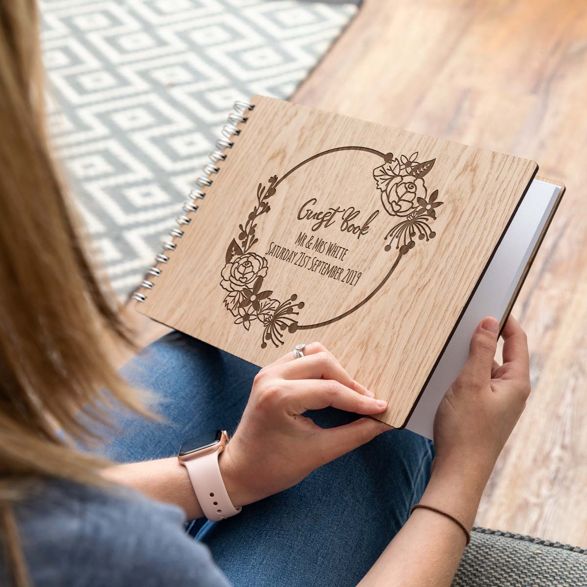 Wooden wedding guest book with laser-engraved personalisation