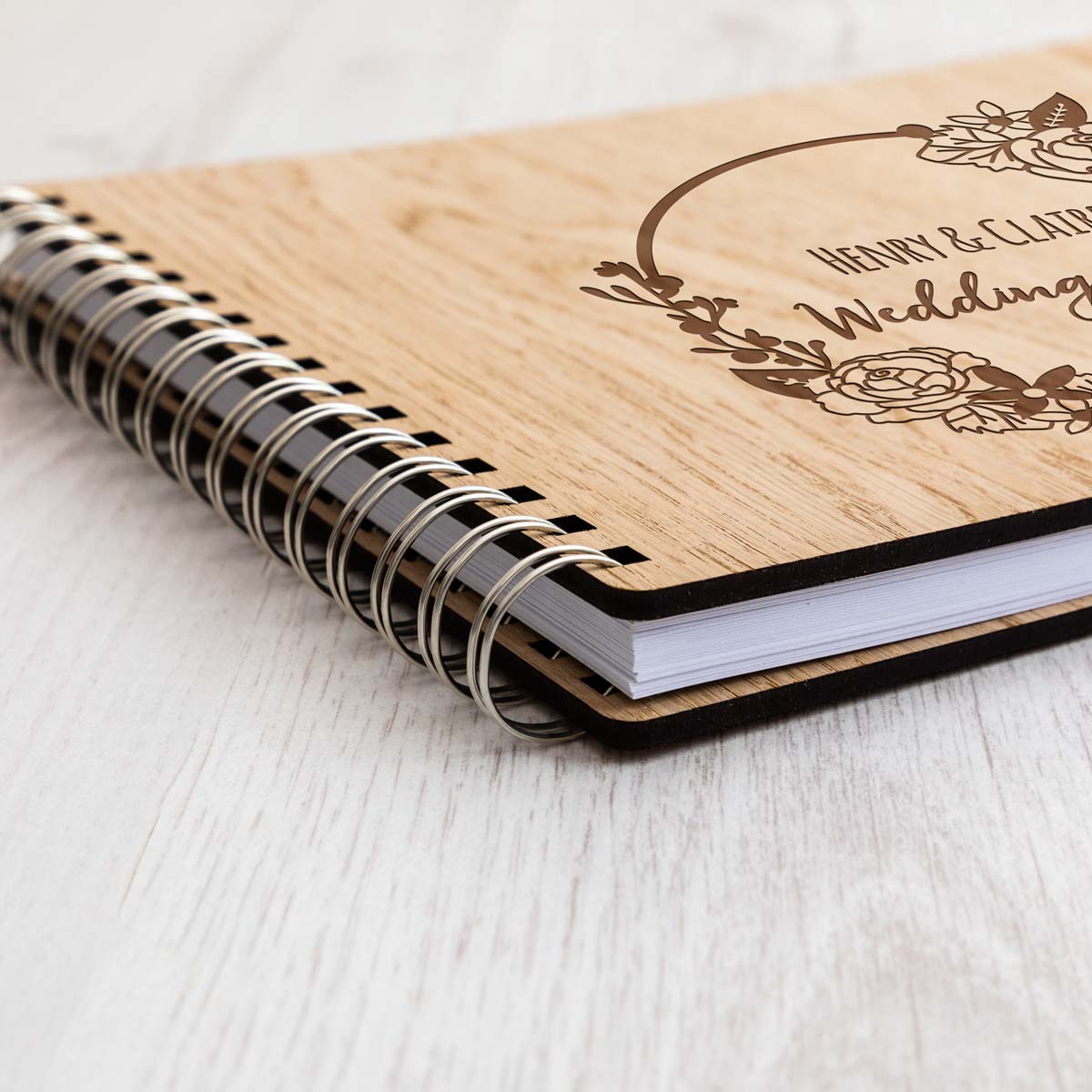 Close up of wooden wedding planner notebook