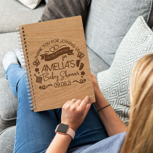 Personalised baby shower guest book with laser-engraved design