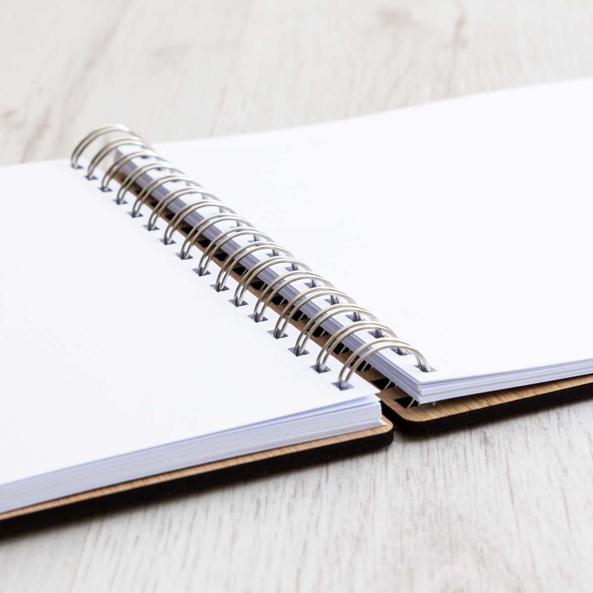 Inside white, plain pages of wedding guest book
