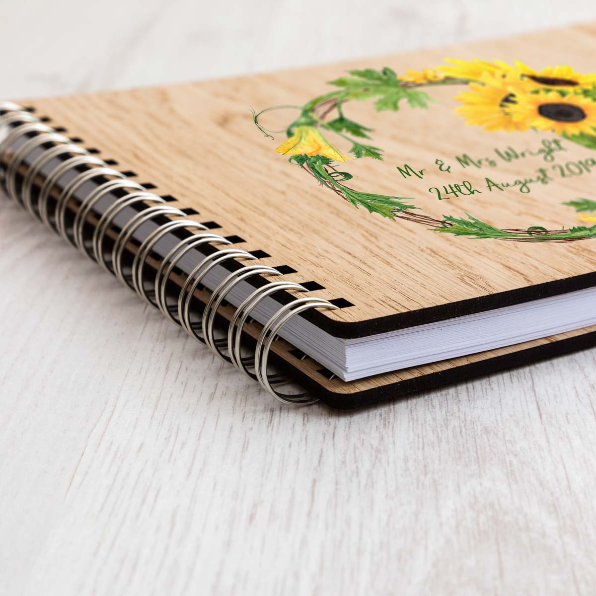 Close up of sunflower wedding guest book
