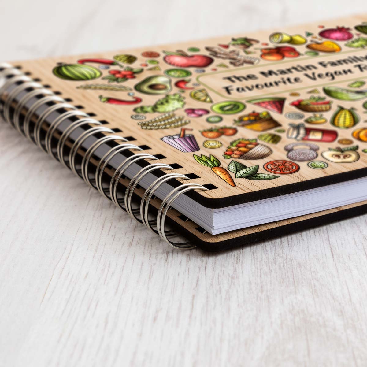 Close up of oak veneer covers of vegan recipe book