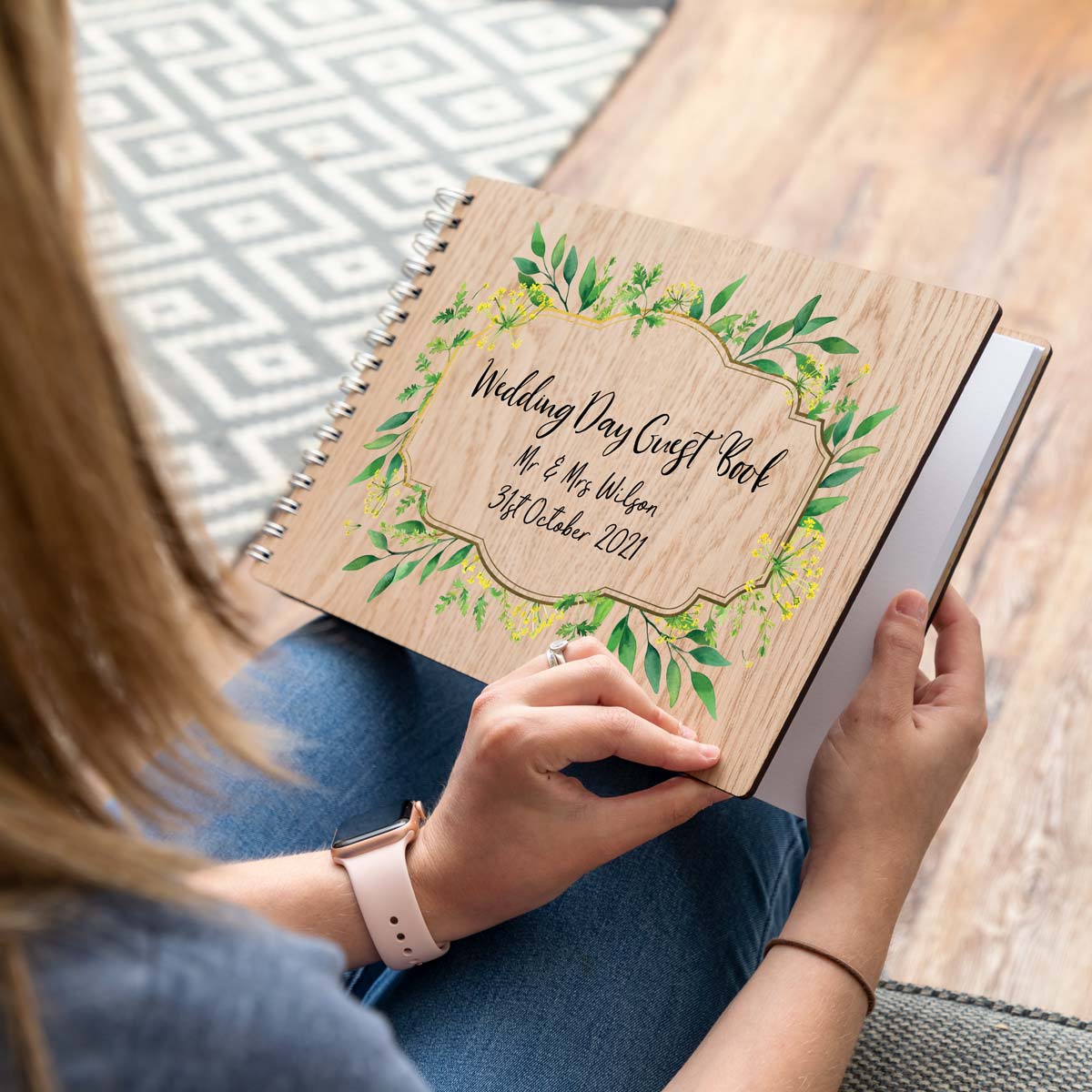 Personalised wedding day guest book with spring flowers design