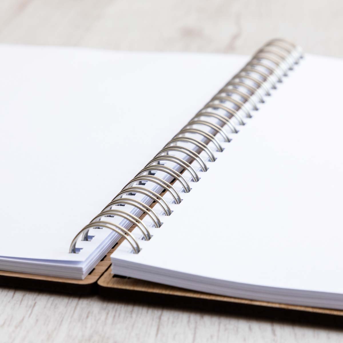 Inside plain, white pages of guest book