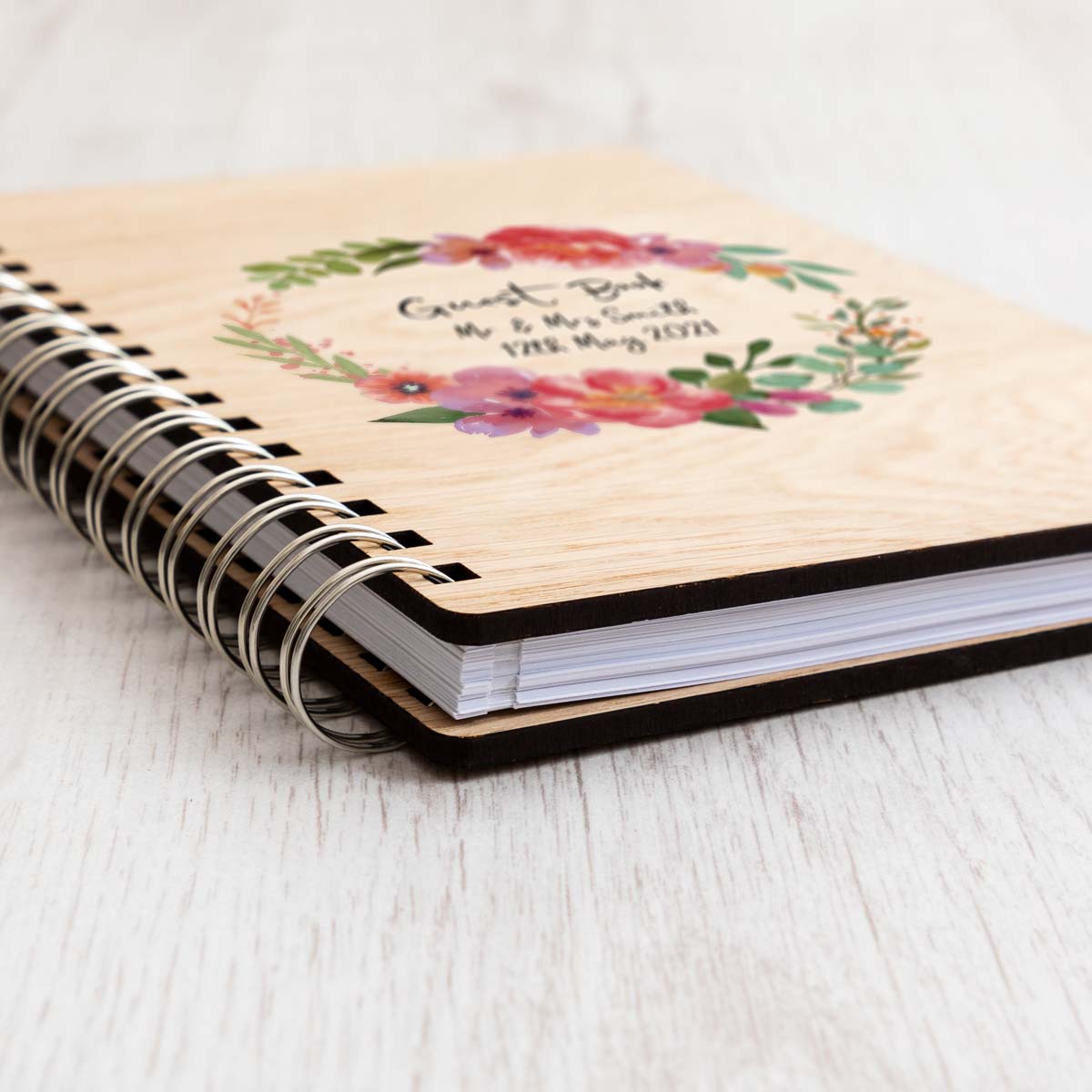 Close up of oak veneer covers of wedding guest book
