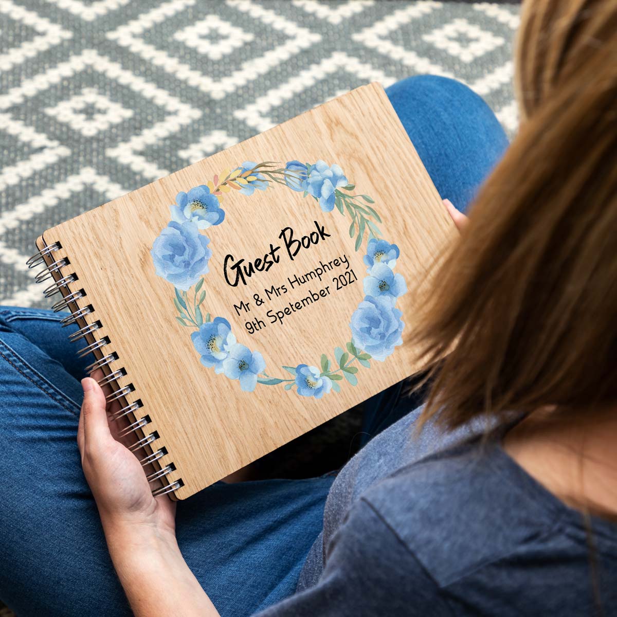 Personalised wedding guest book with blue floral design