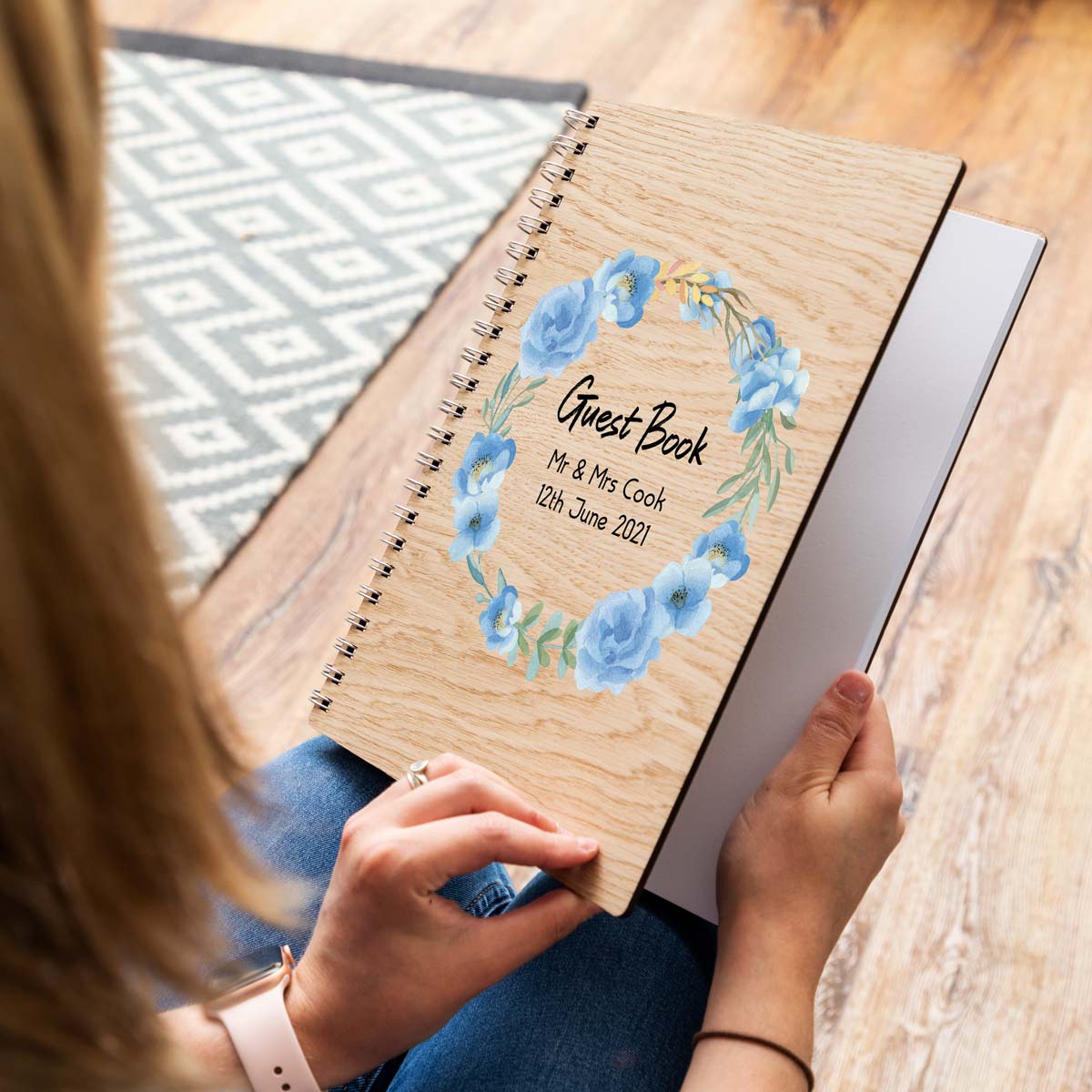 A4 portrait wedding guest book with blue flower design and personalisation