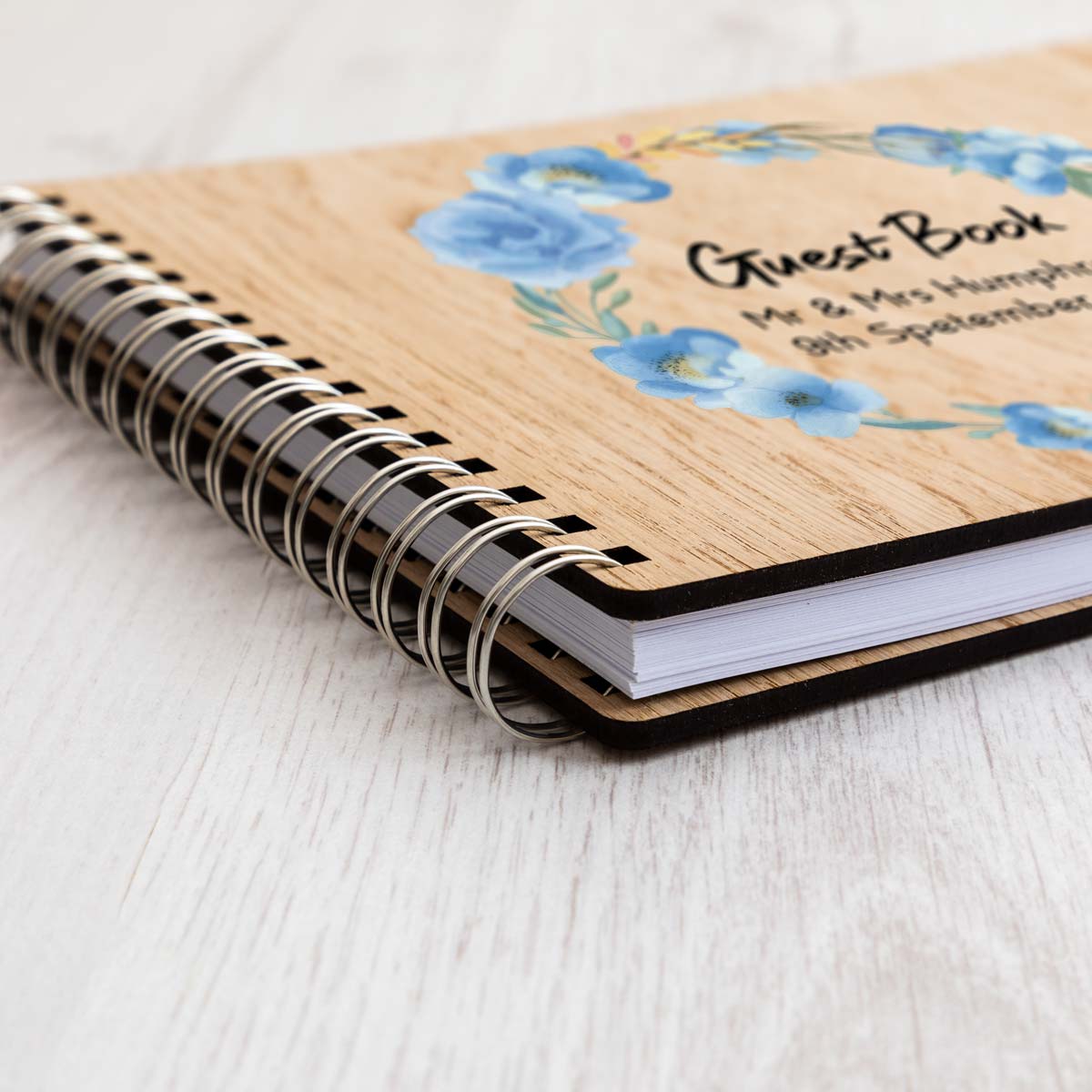Close up of oak veneer covers of wedding guest book
