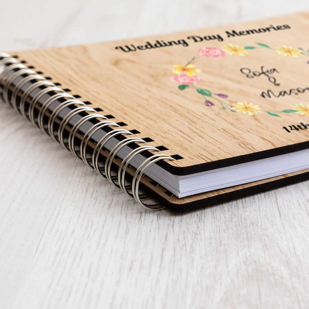 Close up oak veneer covers of wedding photo album
