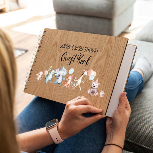Wooden guest book for baby shower with jungle animals design