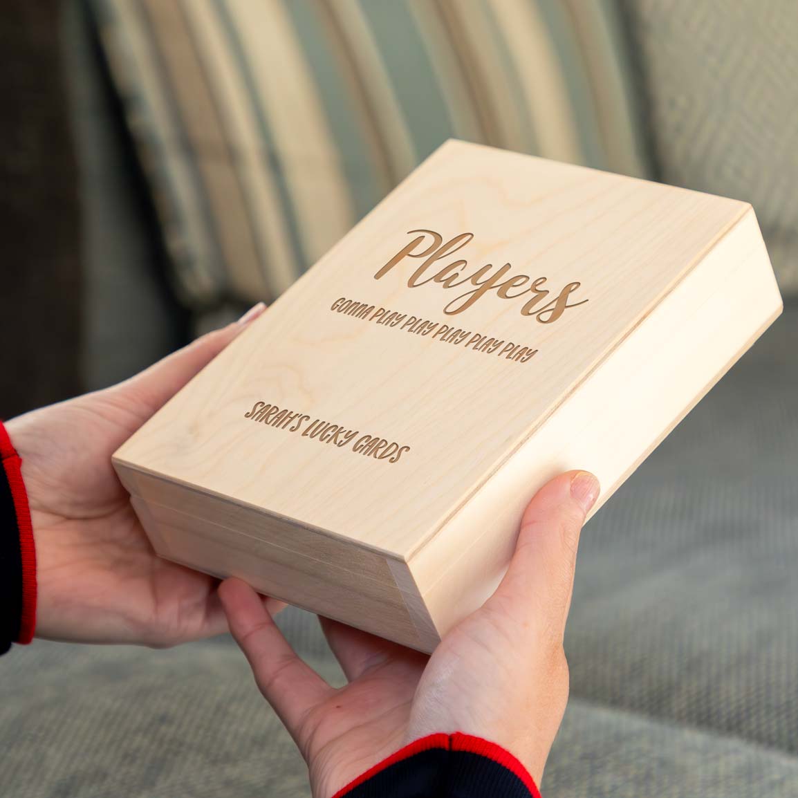 Wooden playing cards box engraved with personalised text.