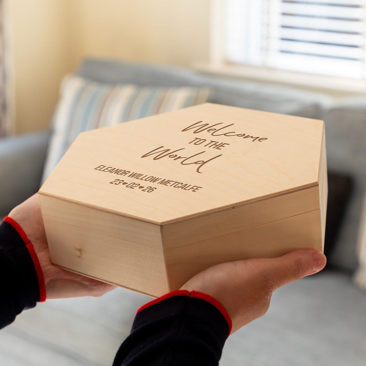 Wooden hexagon keepsake box with 'Welcome to the World' personalised engraving for new baby gift.