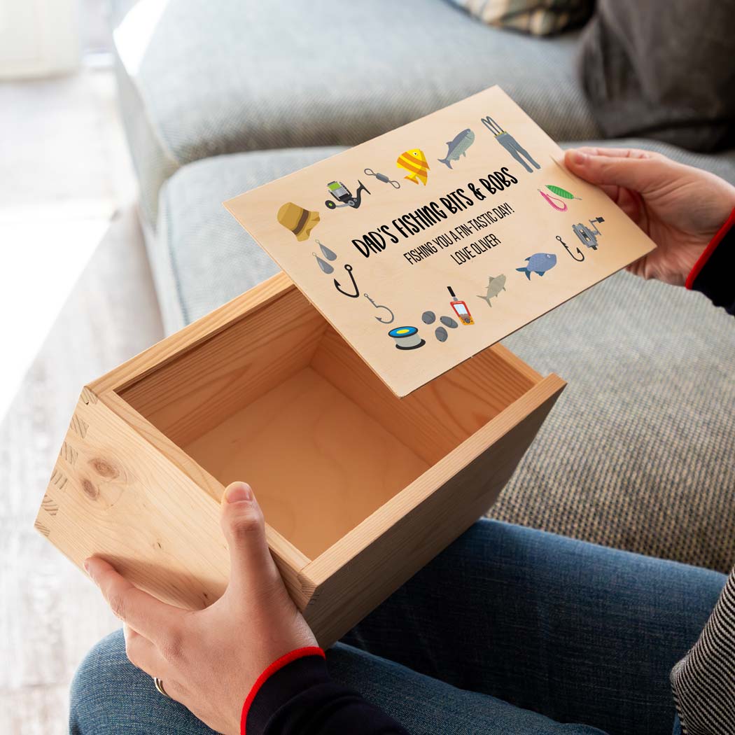 Wooden fishing box with a sliding lid featuring a fishing design and personalised text.