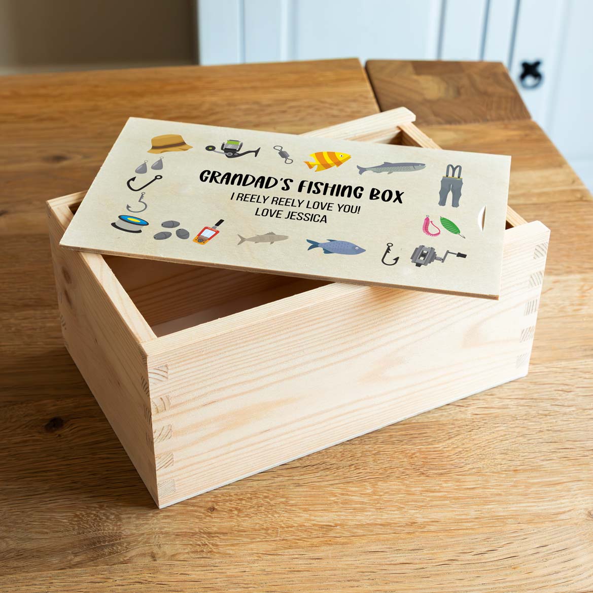 Wooden fishing box with a personalised fishing design printed on the lid.