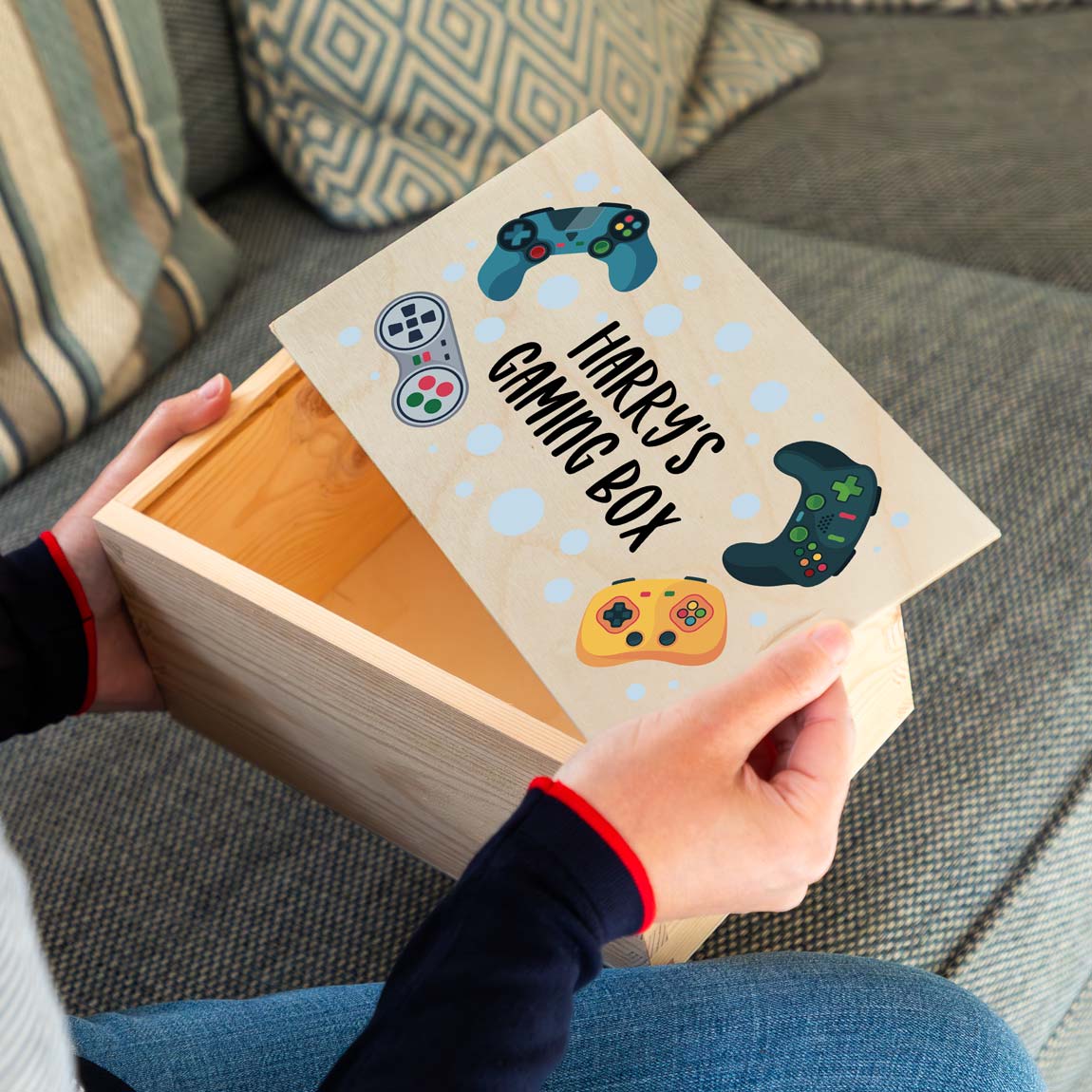 Wooden storage box for gaming accessories printed with a personalised gaming-themed design.