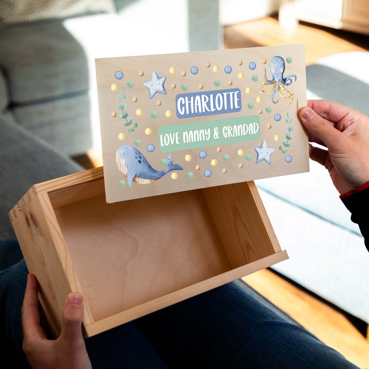 Personalised keepsake box for a new grandchild with a sea animals design.