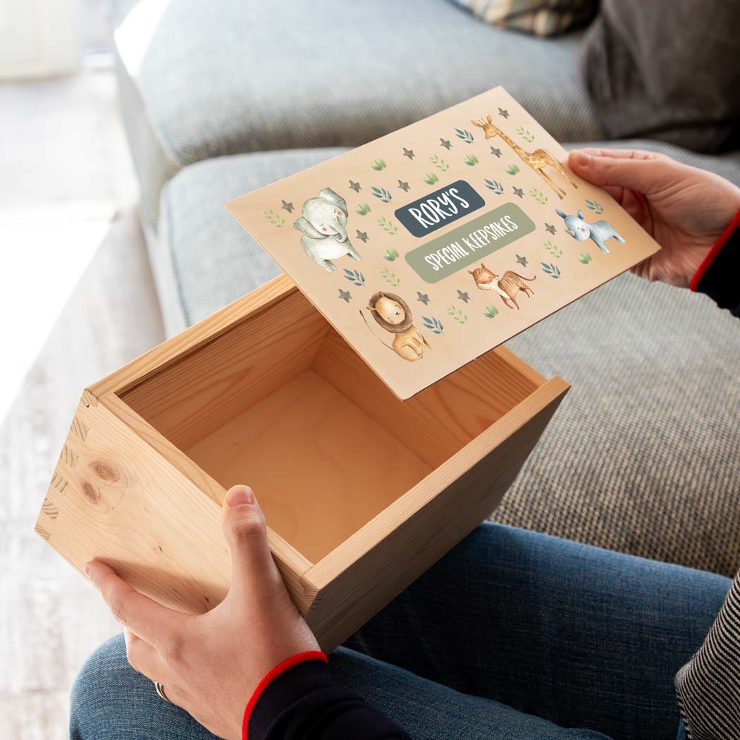 Wooden new baby keepsake box with jungle animals design and personalised text.