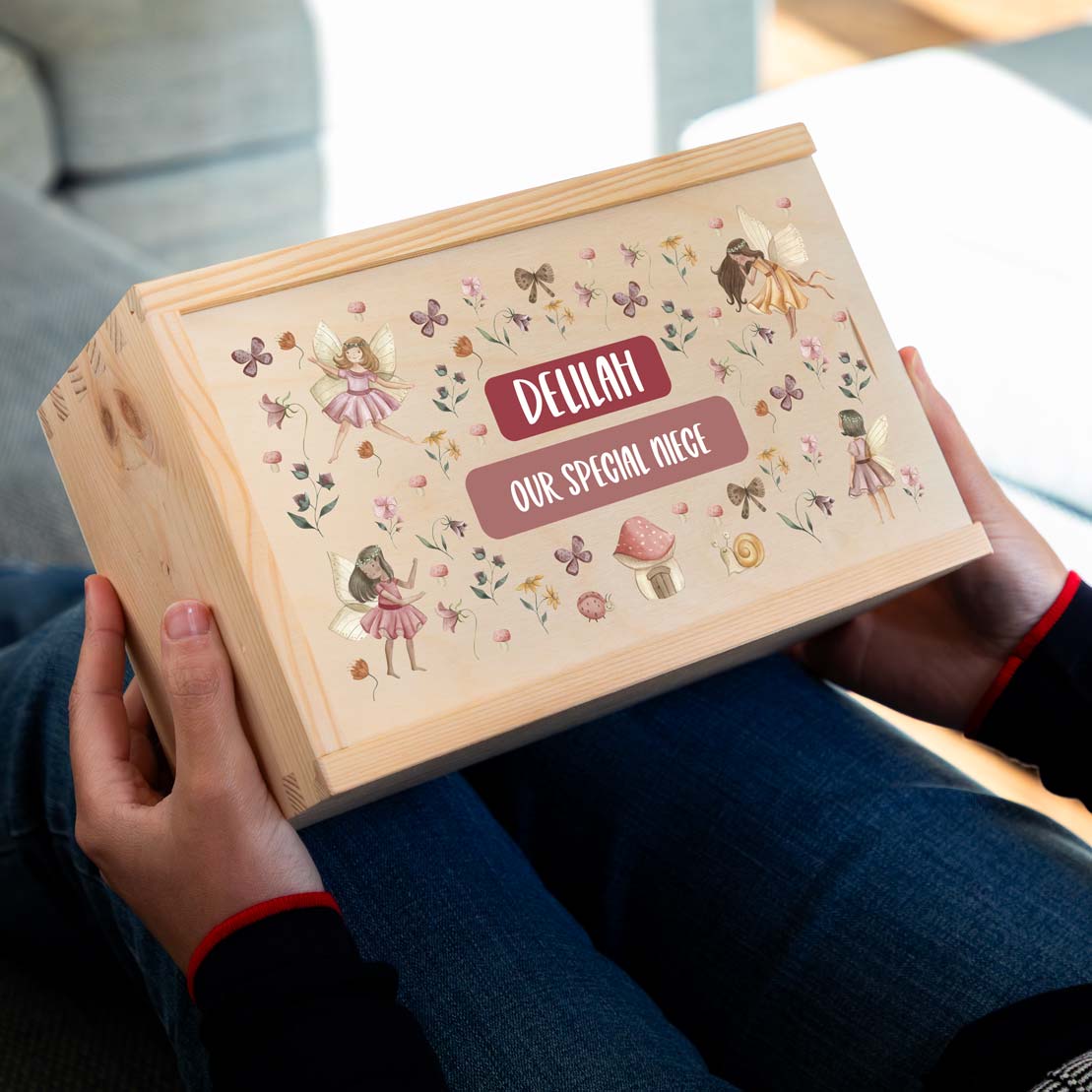 Wooden keepsake box with fairy illustrations and personalised text.