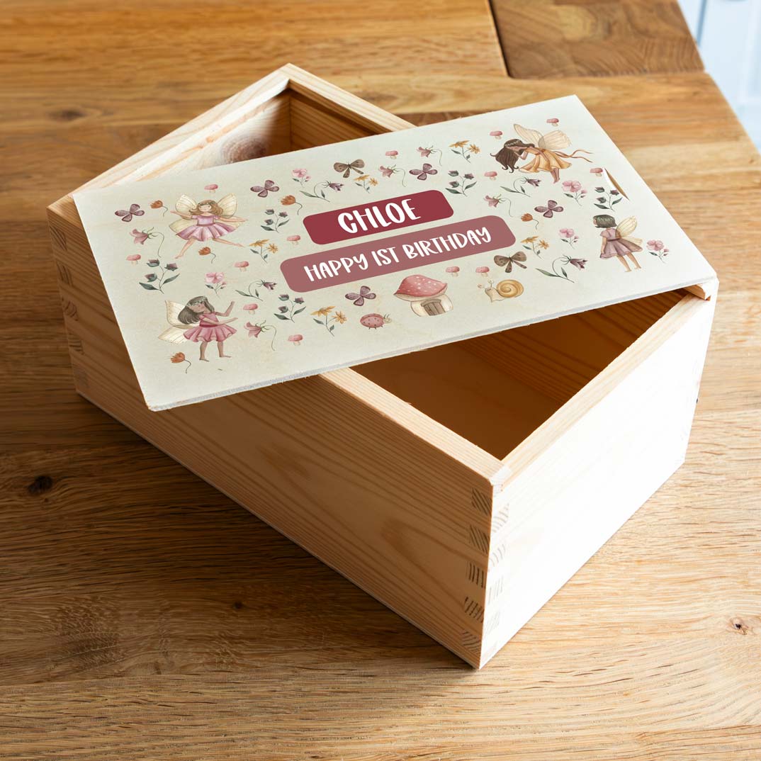 Wooden keepsake box with a personalised fairy design to celebrate 1st birthday.