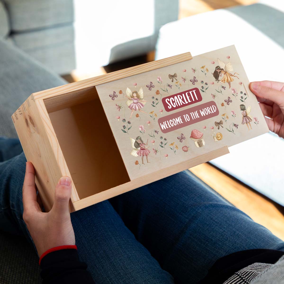 Wooden keepsake box with fairy design and personalised text to celebrate a new baby.