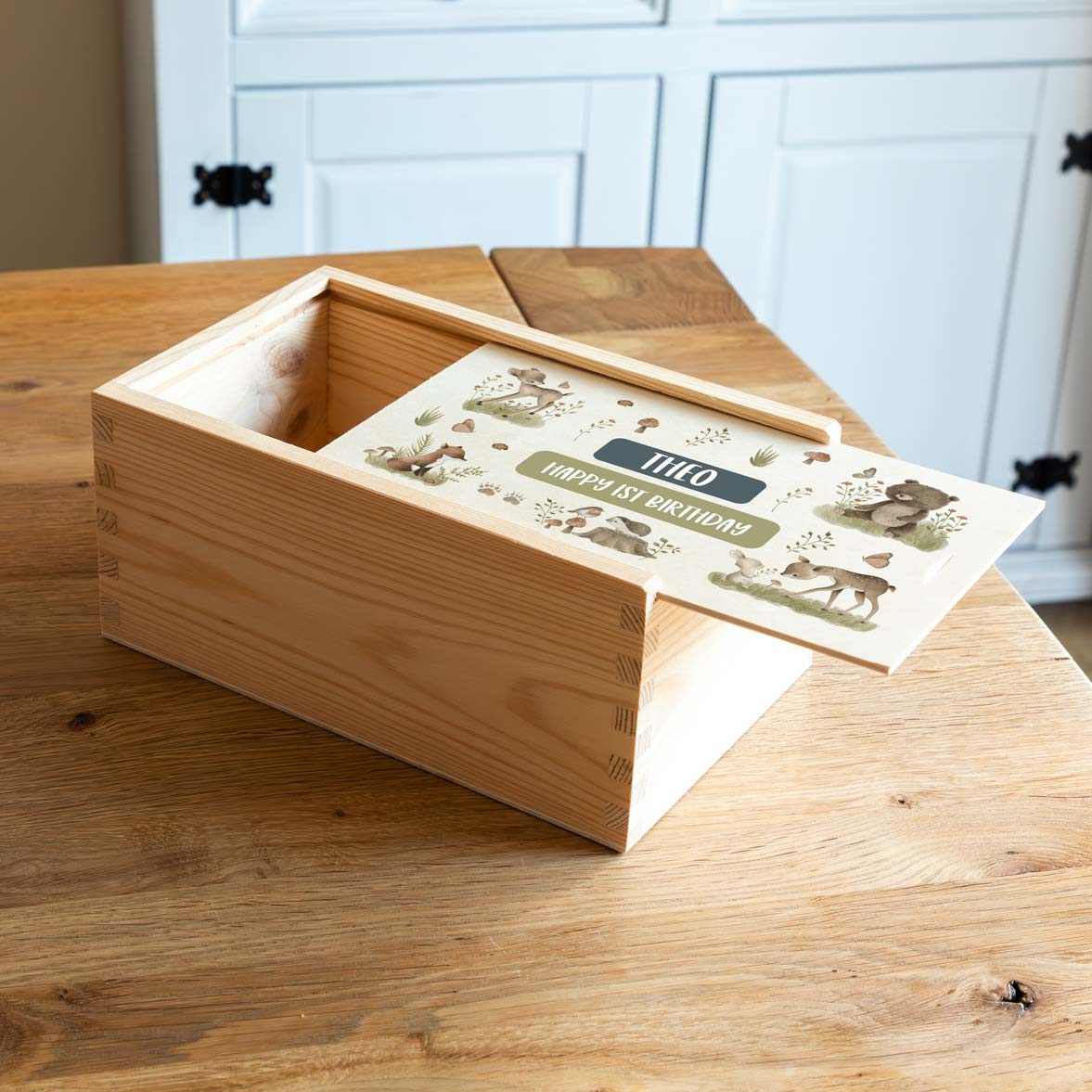 Wooden keepsake box to celebrate a 1st birthday with woodland animal designs and personalised text.