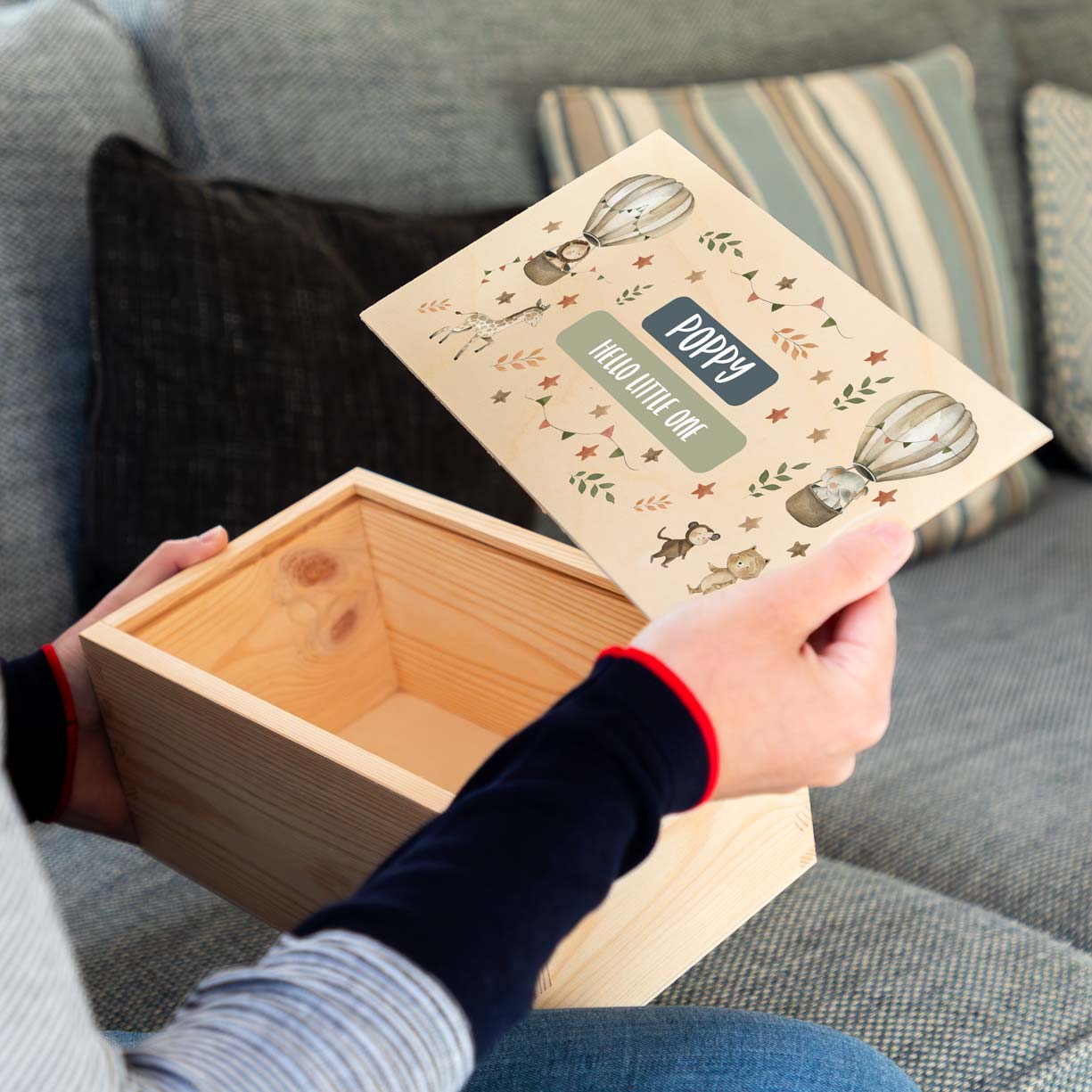 Wooden keepsake box with safari animal illustrations and personalised text for a new baby gift.